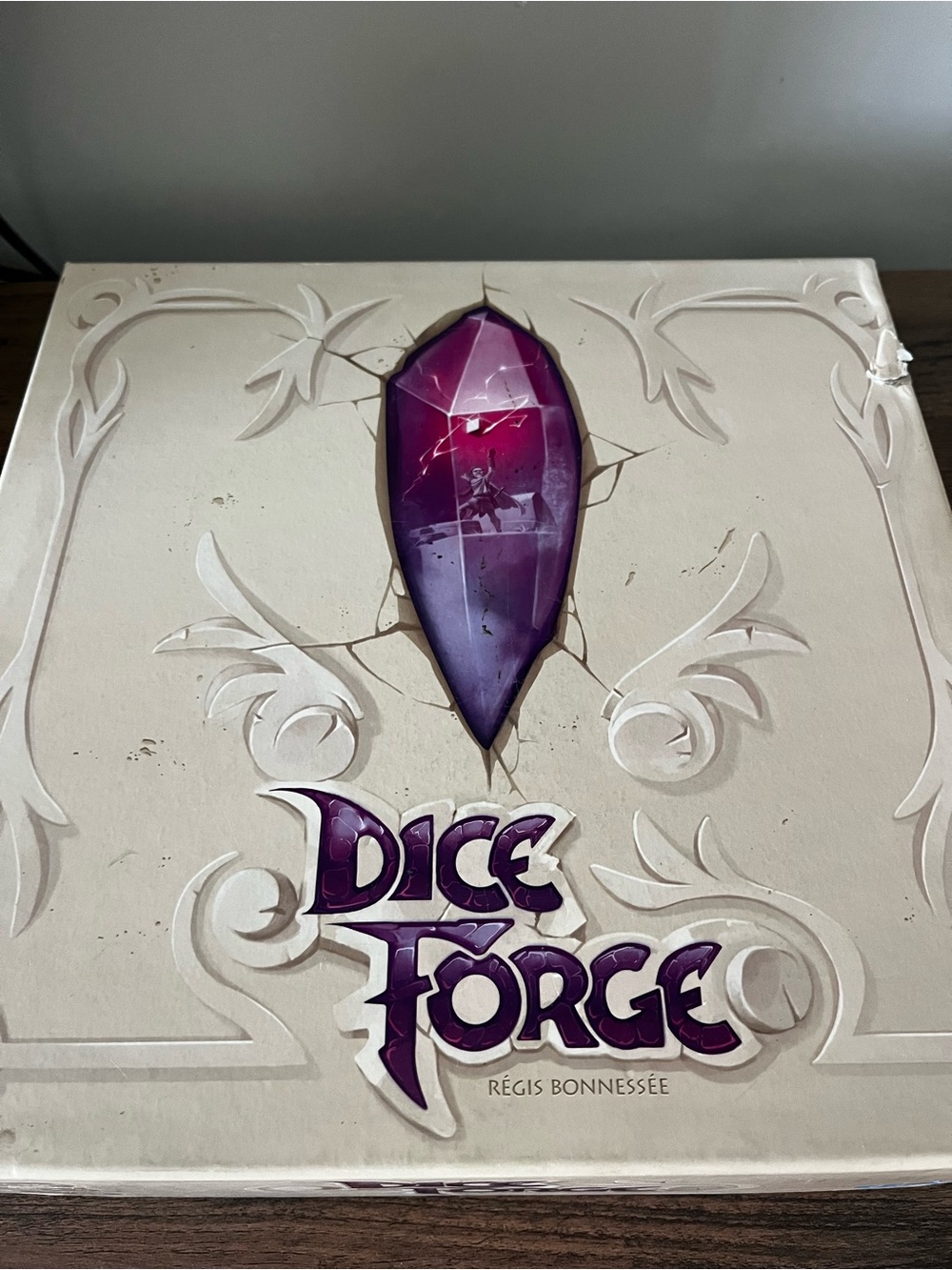 Dice Forge Board Game Box with Purple Gem Artwork